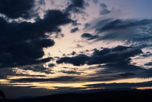 Just another sunset in my village… yet there’s always something magical about the colors. The way the light fades through the clouds, turning blue into gold, feels different every time. Familiar, but never ordinary.