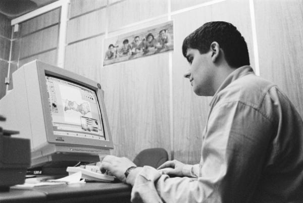 University of Aveiro, early 1990s. A pivotal moment in my life. This image was taken in the old computer centre where the SAPO.PT portal was born. In the foreground, a colleague works on the “Turista Virtual” project, and on the wall behind him is a photo of the SAPO co-founders — from left to right: myself, Fernando Cozinheiro, João Luís, Celso Martinho, and Hélder Bernardo.